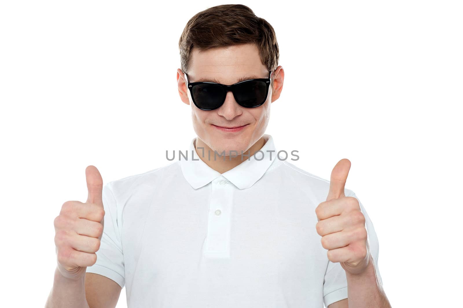 Handsome guy gesturing double thumbs up wearing goggles