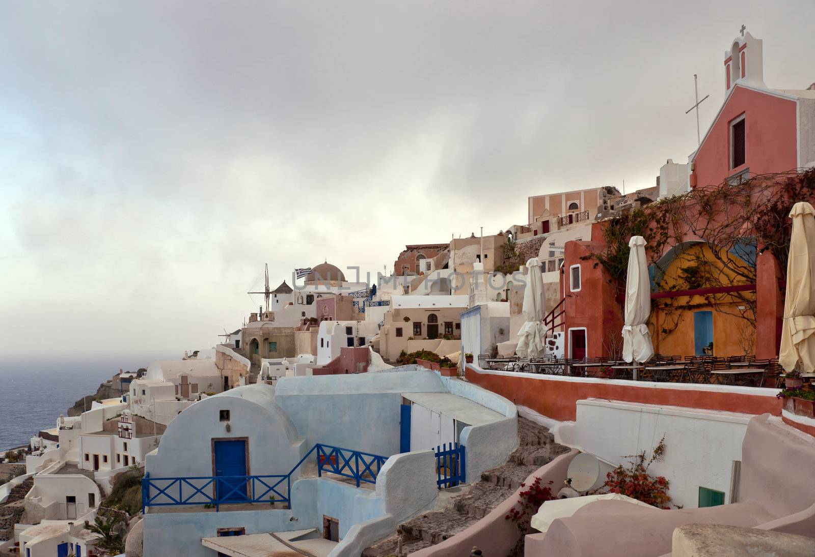 Morning in the cyclades village with traditional buildings