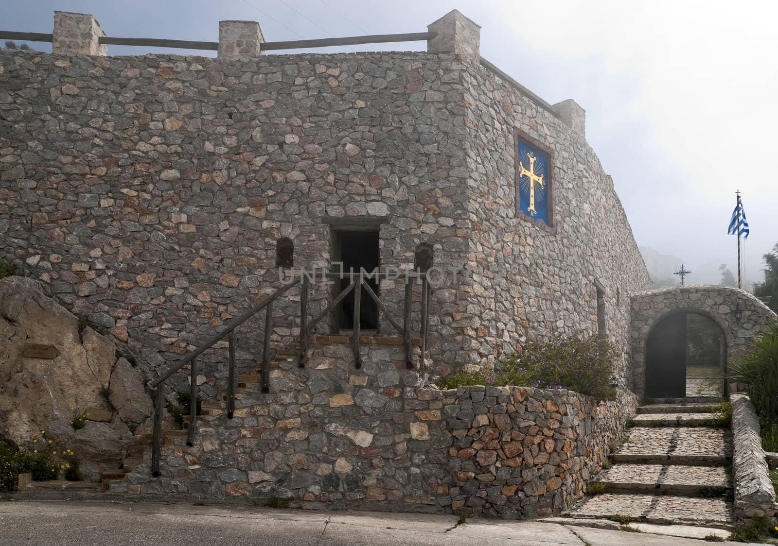 Monastery stone wall and entrance by mulden