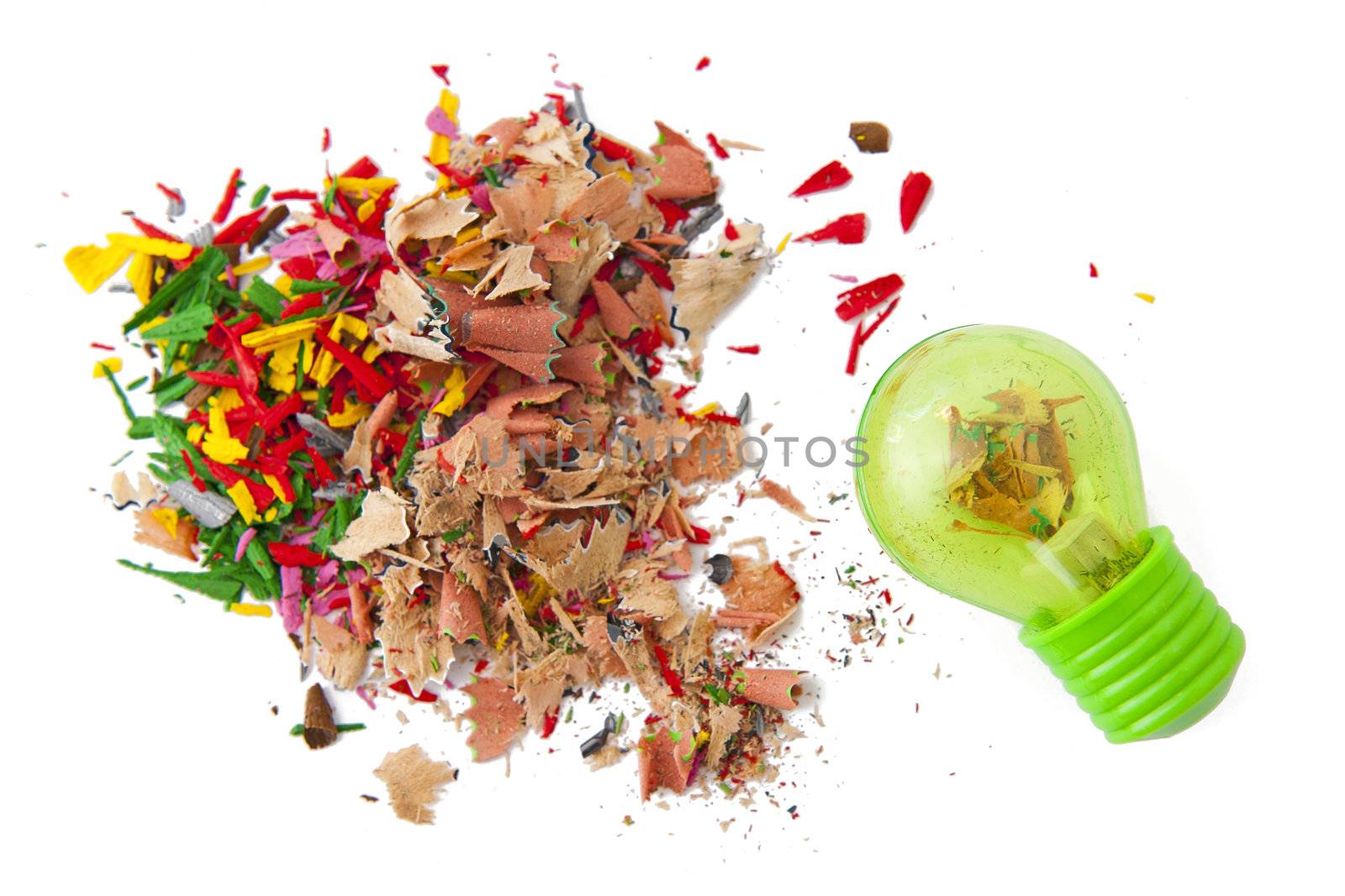 Shavings and sharpener isolated on the white background