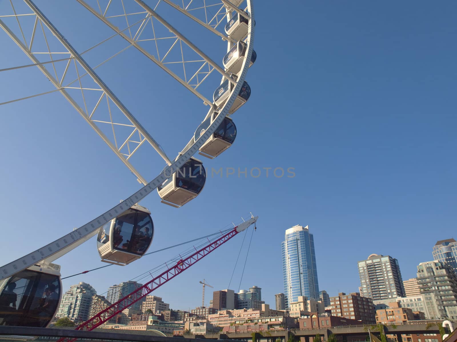 Ferris wheel and Seattle skyline near the waterfront.