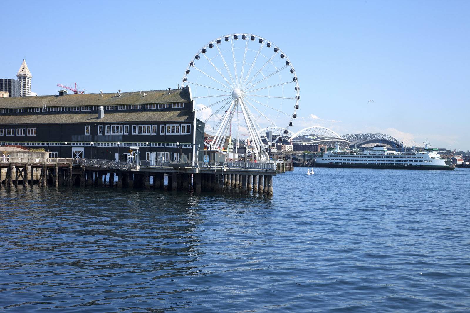 The Seattle aquarium and ferris wheel. by Rigucci