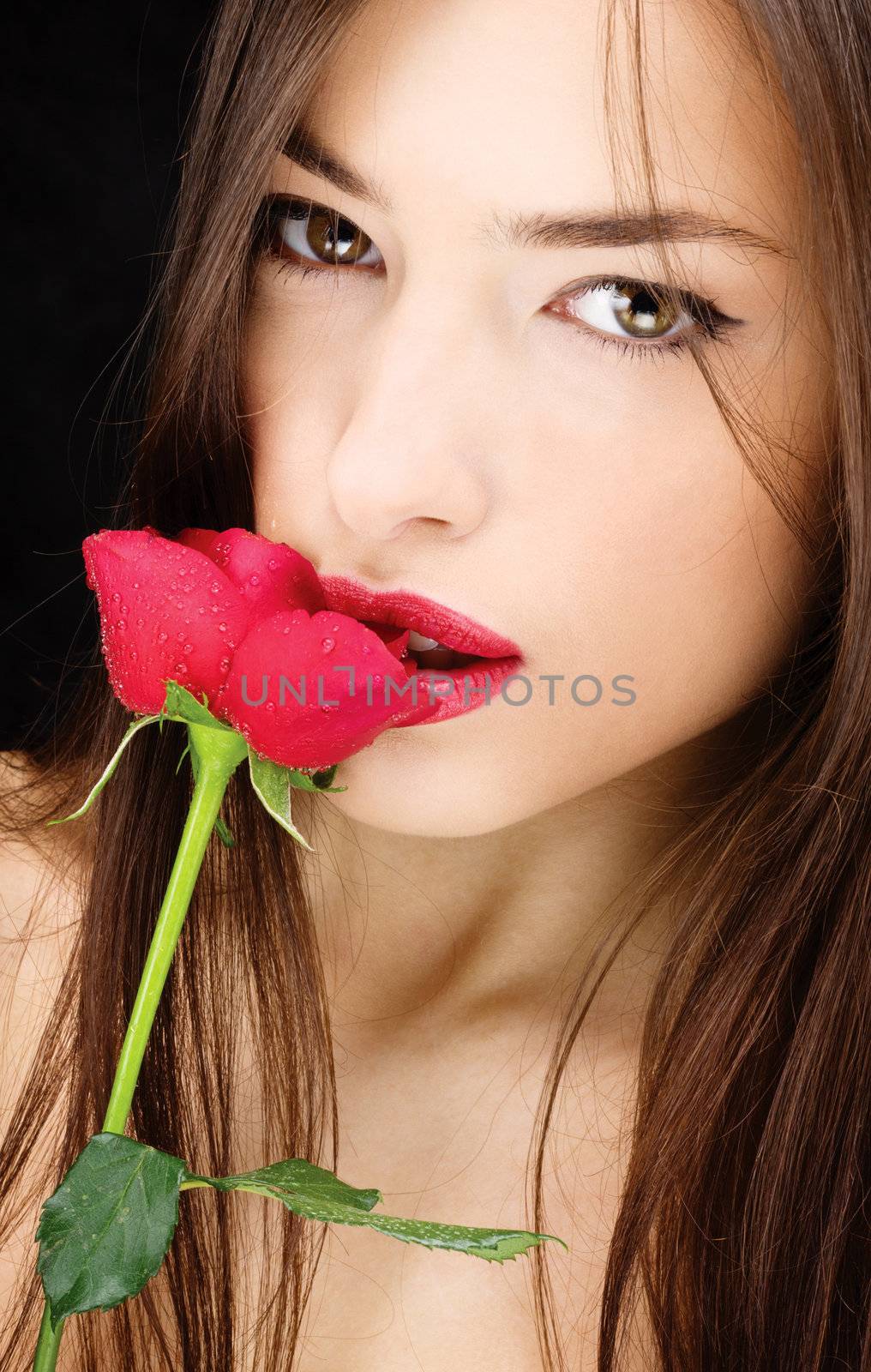 Pretty black hair woman and red rose