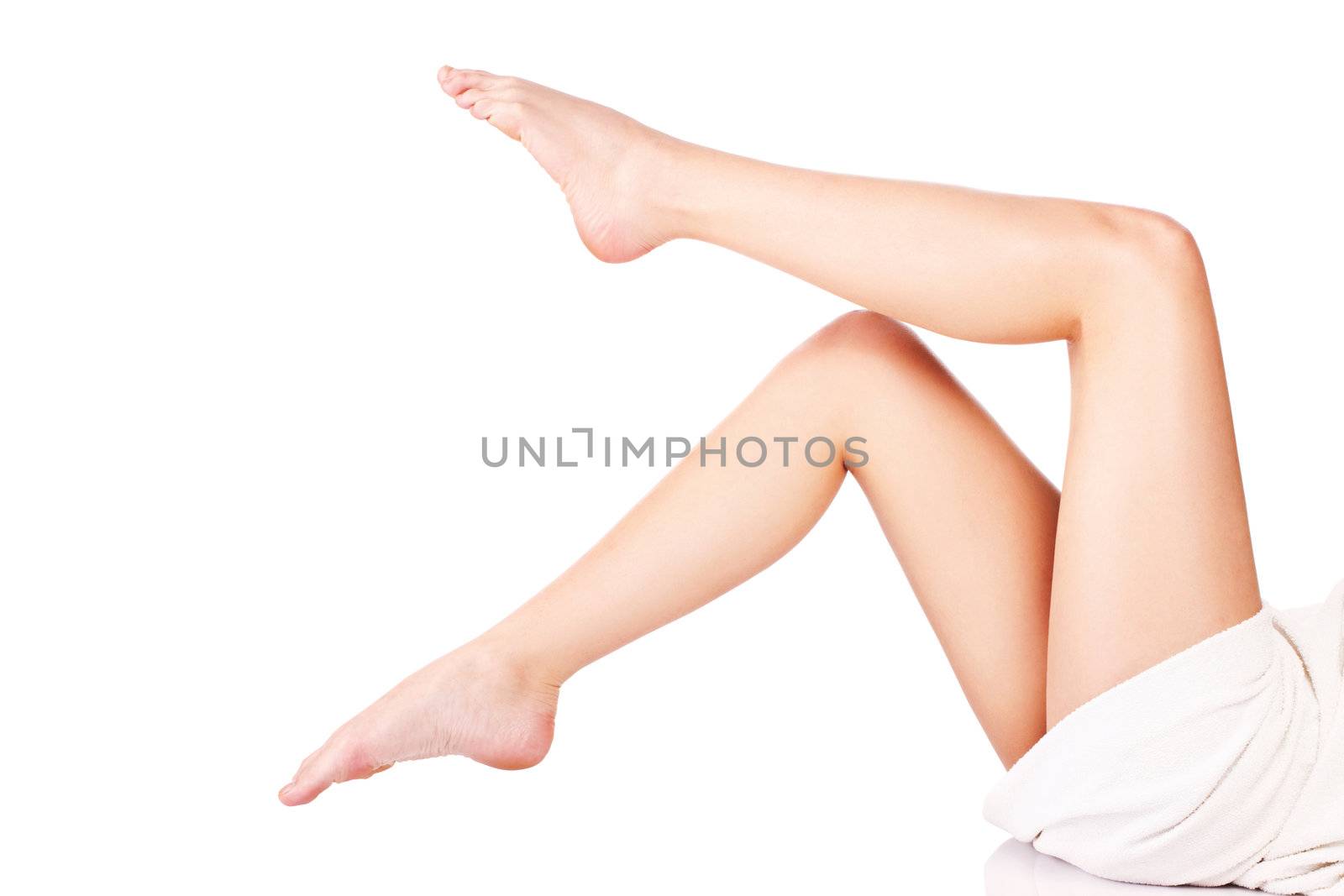 legs of young woman, isolate on white background