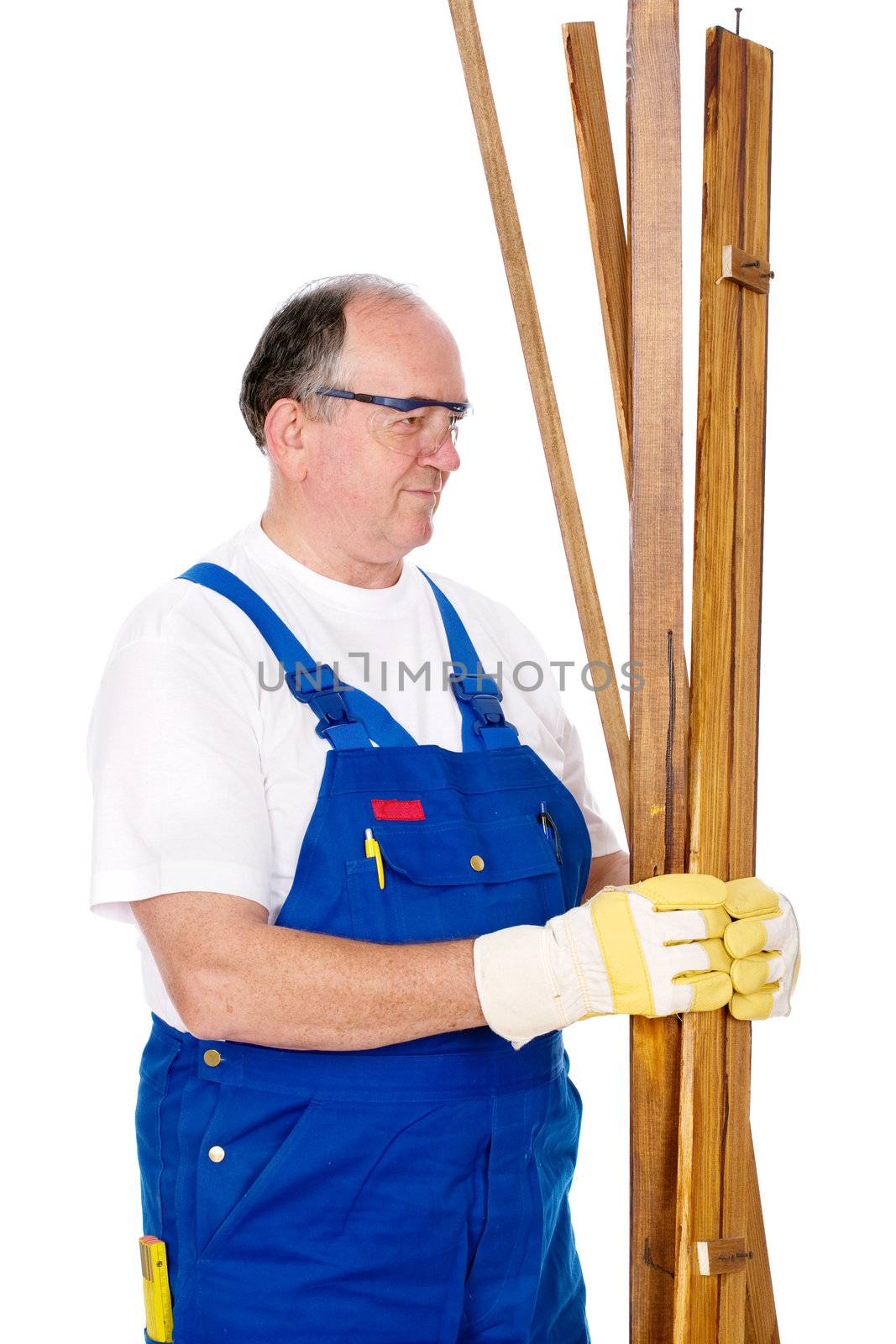 Middle age worker holding boards and preparing to work, isolated on white