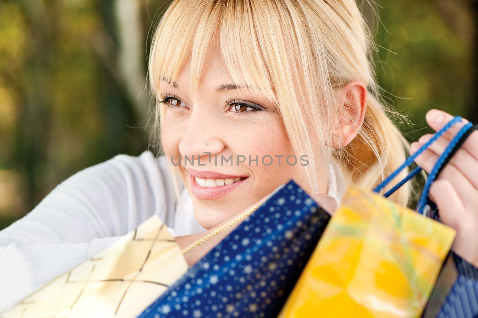 blond with shopping bags by imarin