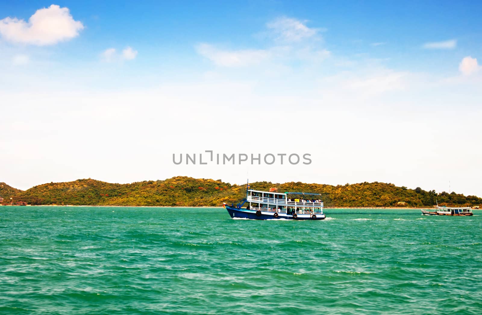 wooden ferry boat in the sea of thailand