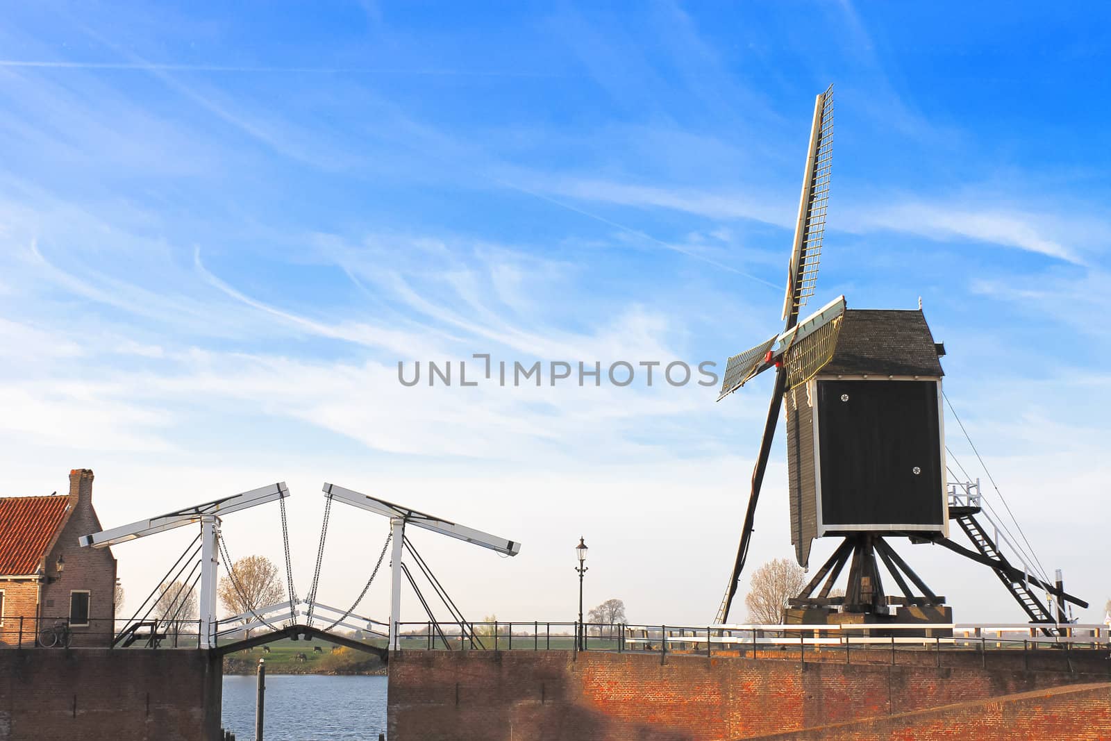 Bascule bridge and  windmill at sunset. Heusden. Netherlands