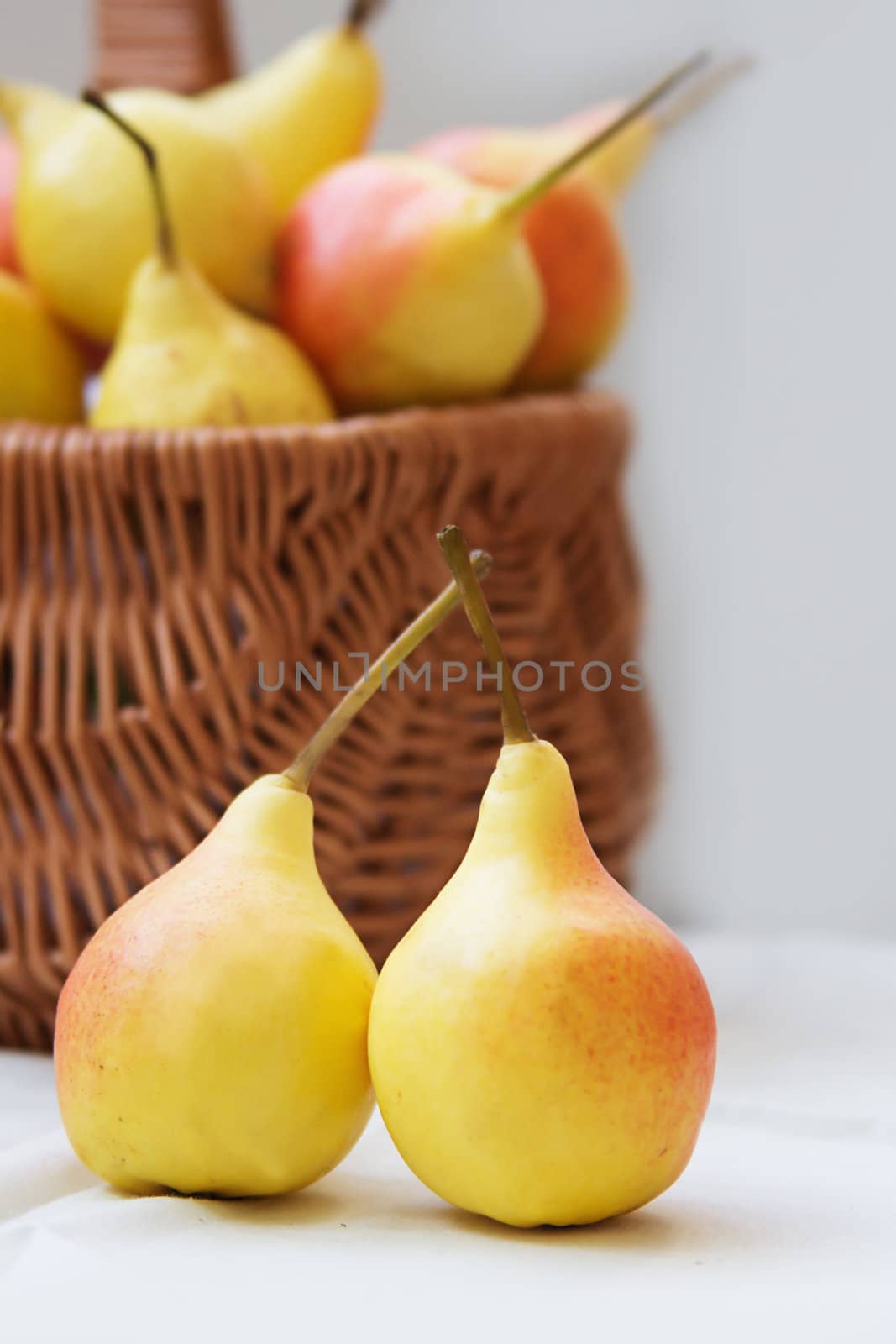 Some yellow pears in basket by Angel_a