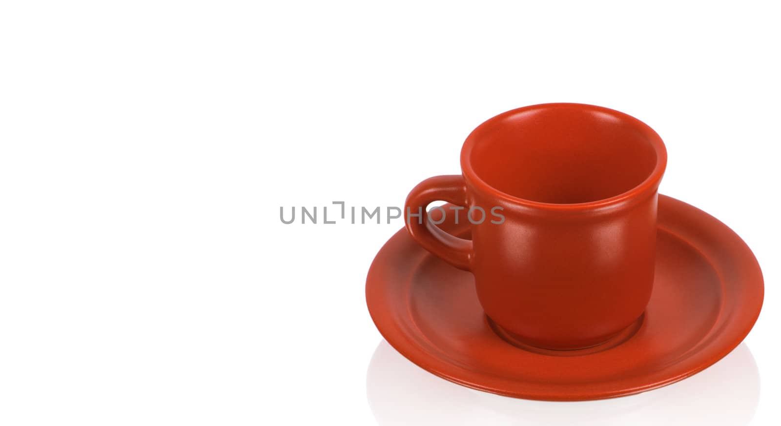 Red cup on a red saucer isolated on white background