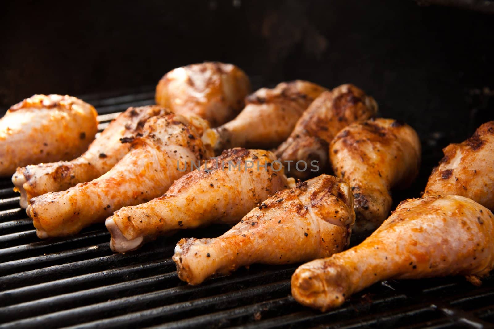 Chicken drumsticks on the grill