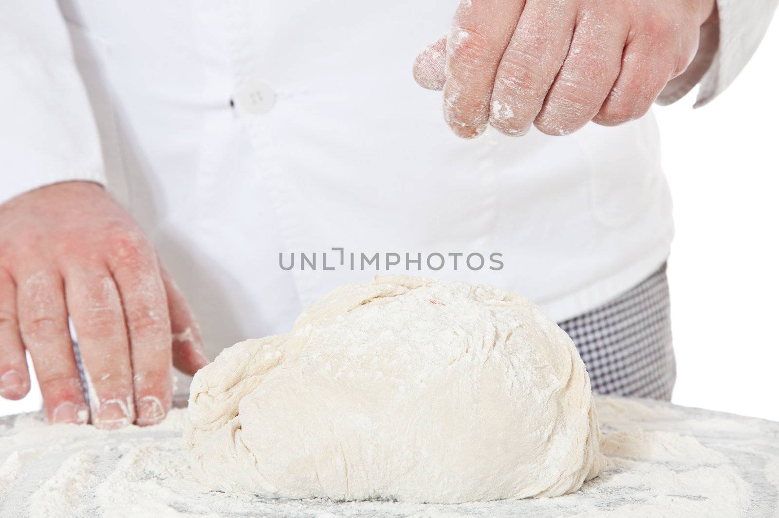 Baker kneading dough. All on white background.