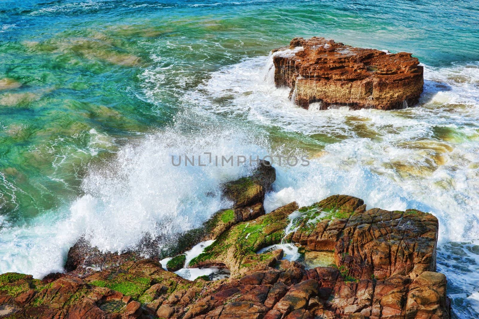 ocean waves on rocks by clearviewstock