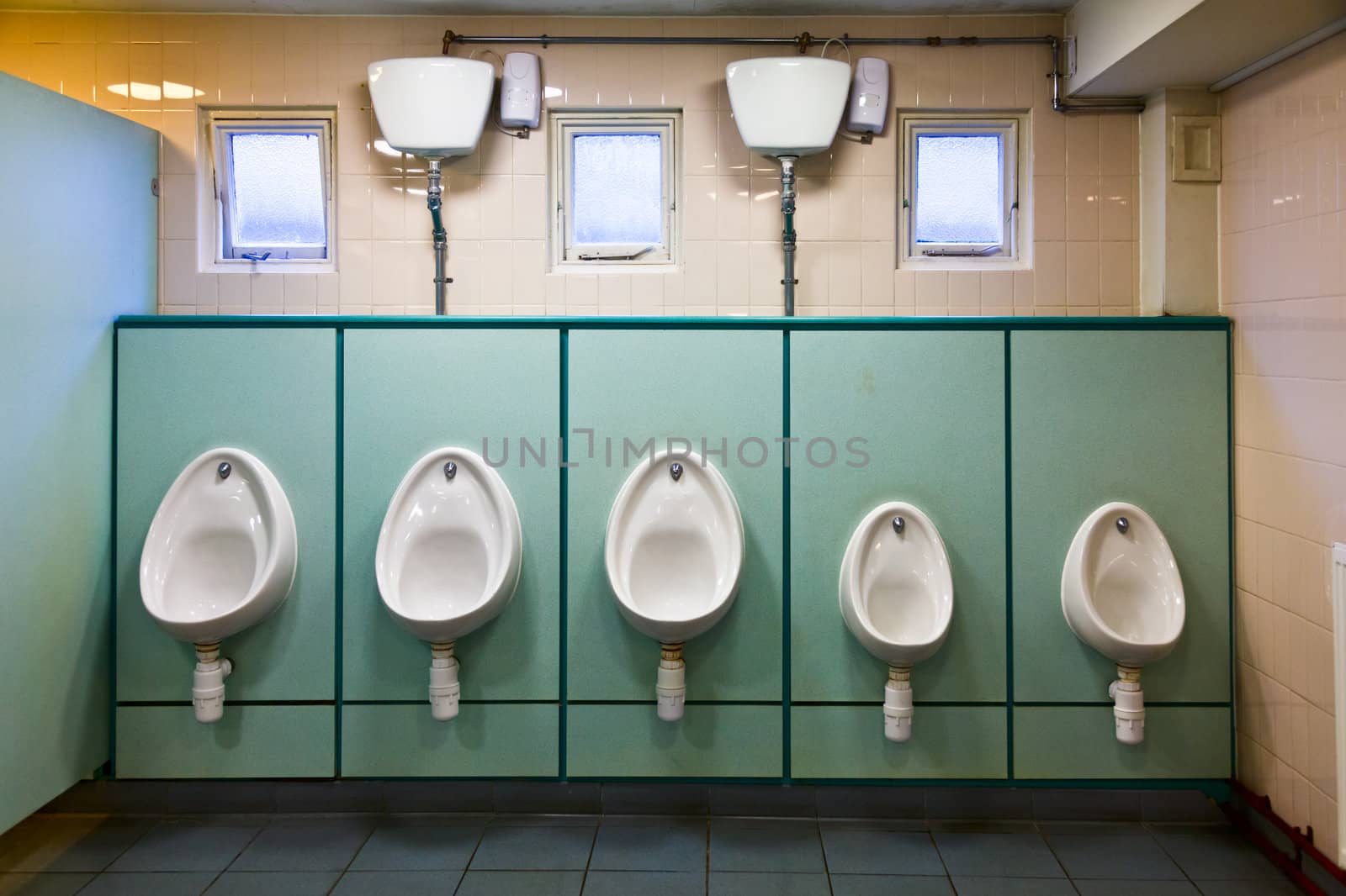Empty public lavatory with urinals