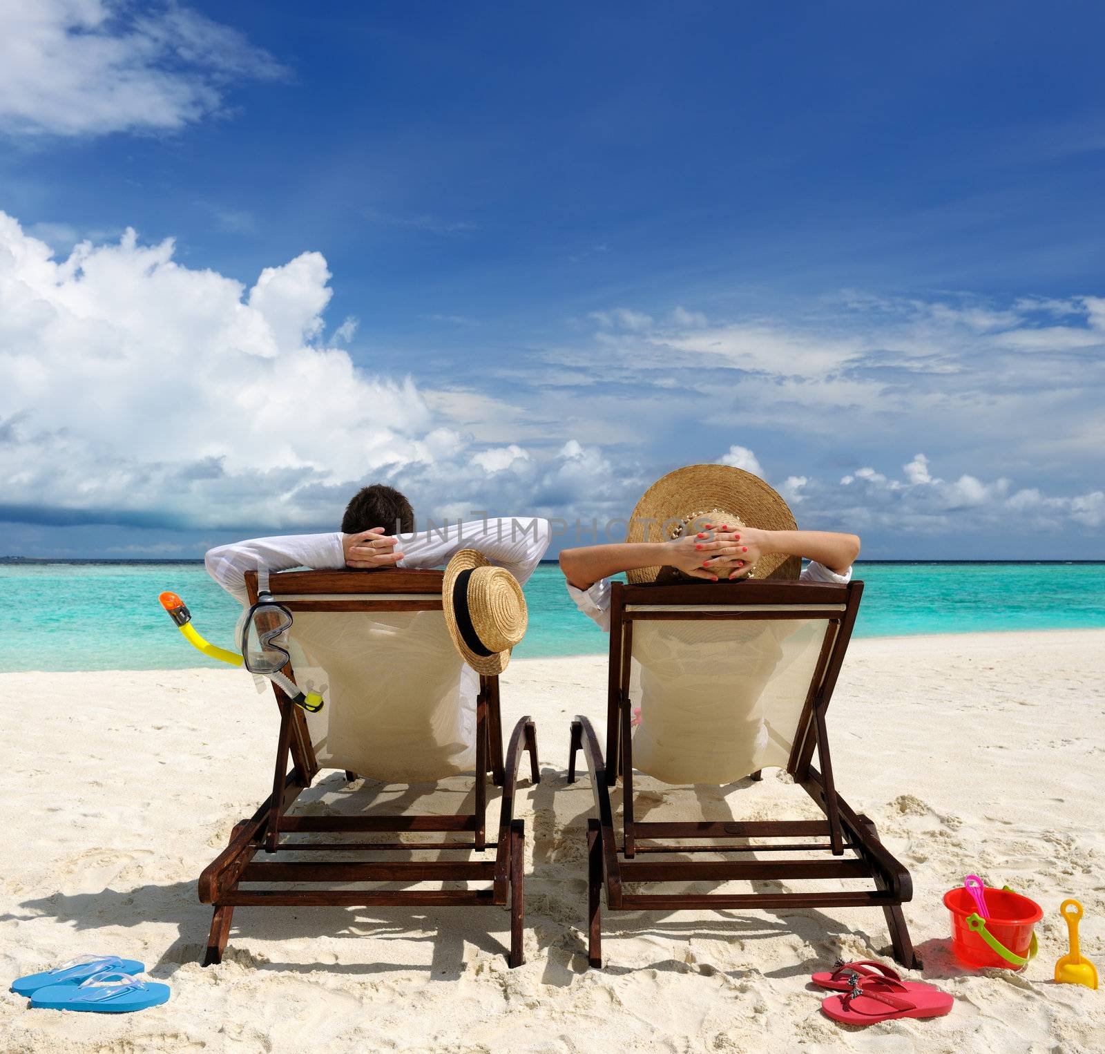 Couple on a tropical beach at Maldives