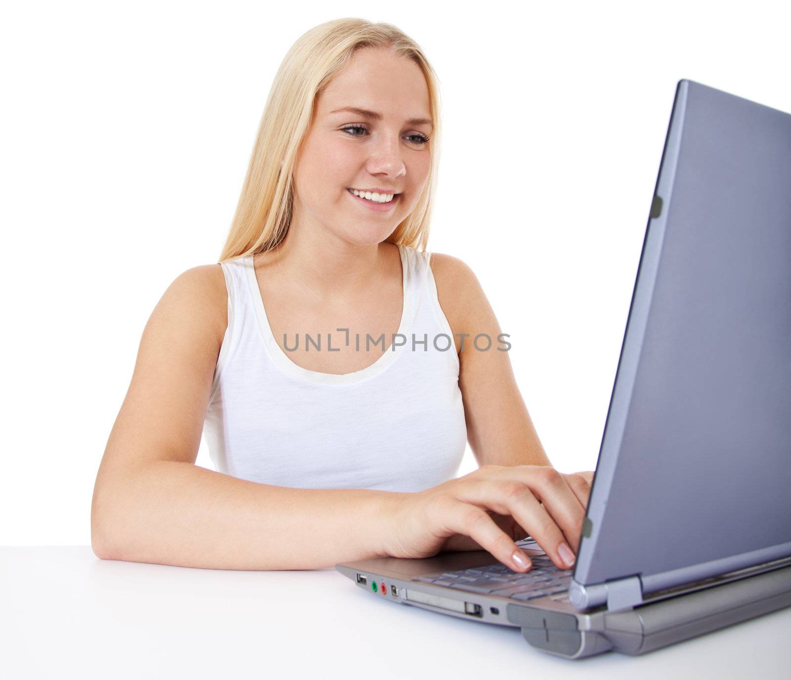 Girl using laptop by kaarsten