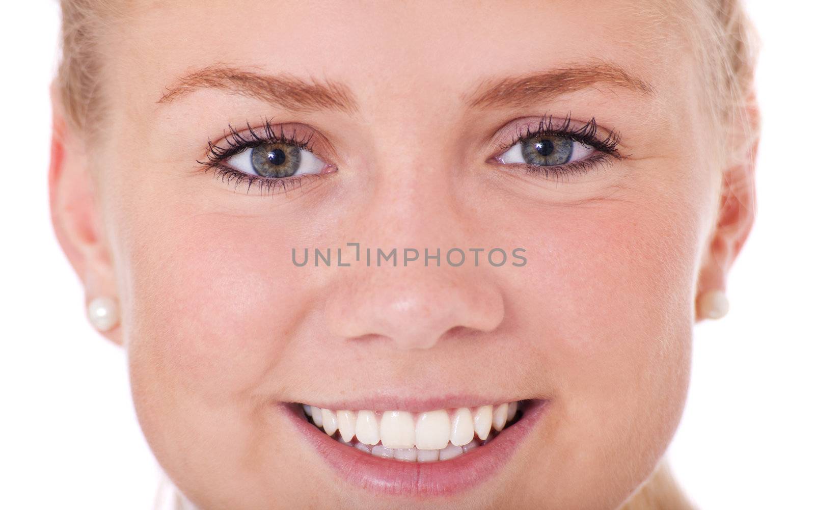 Attractive young woman smiling. All on white background.