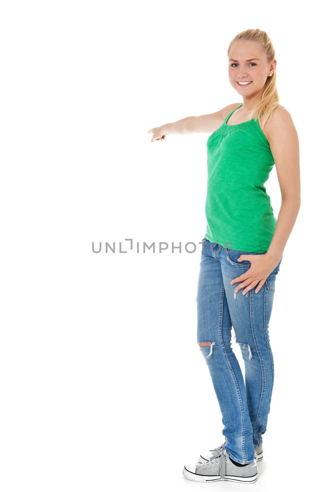 Full length shot of an attractive young woman pointing with finger. All on white background.