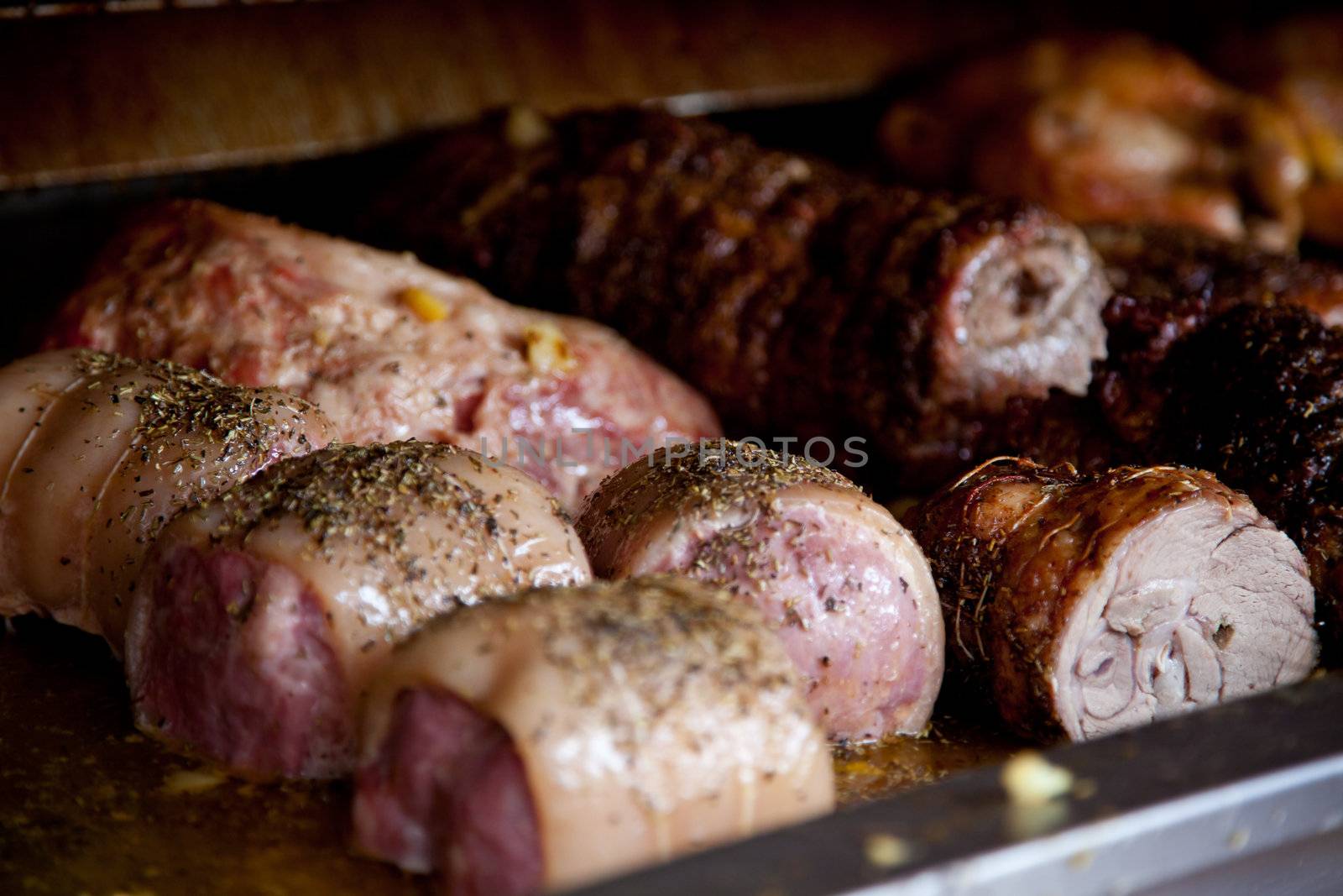 Delicious roasted meat in roasting pan.