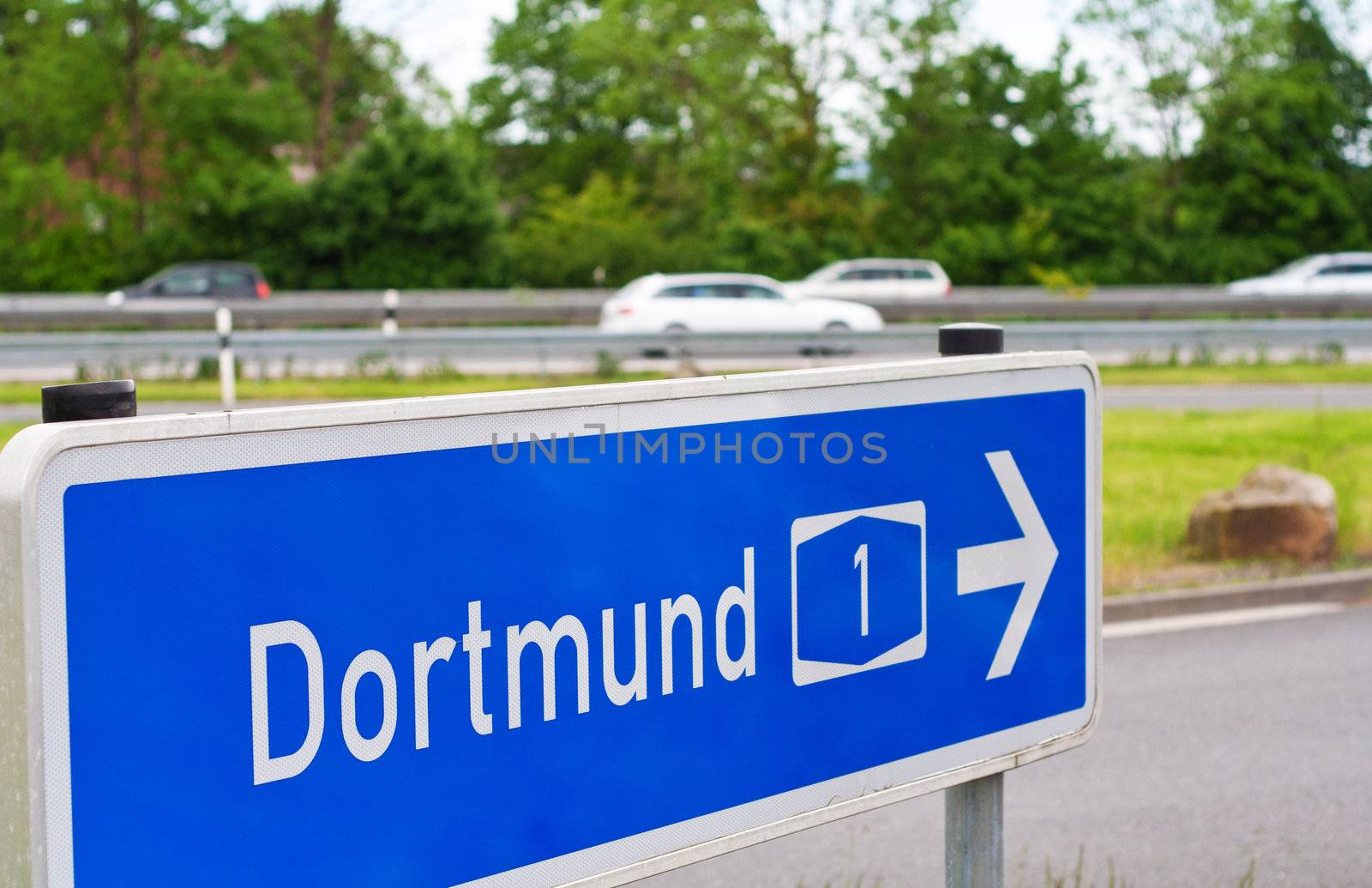 A typical German road sign shows the exit to Dortmund.