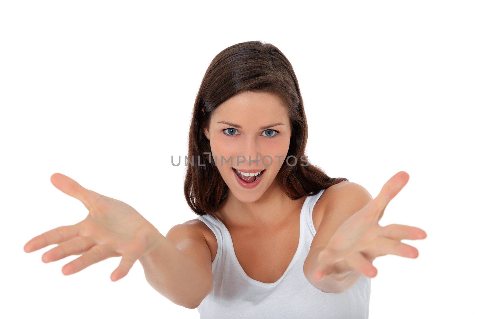 Attractive young woman with welcoming gesture. All on white background.