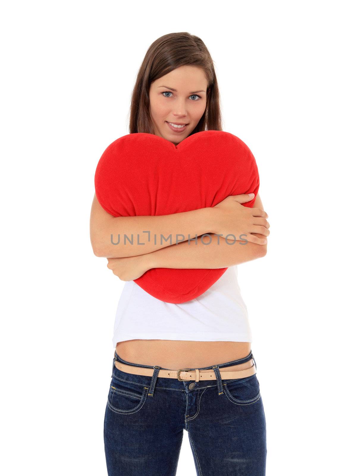woman hugs red heart-shaped pillow by kaarsten