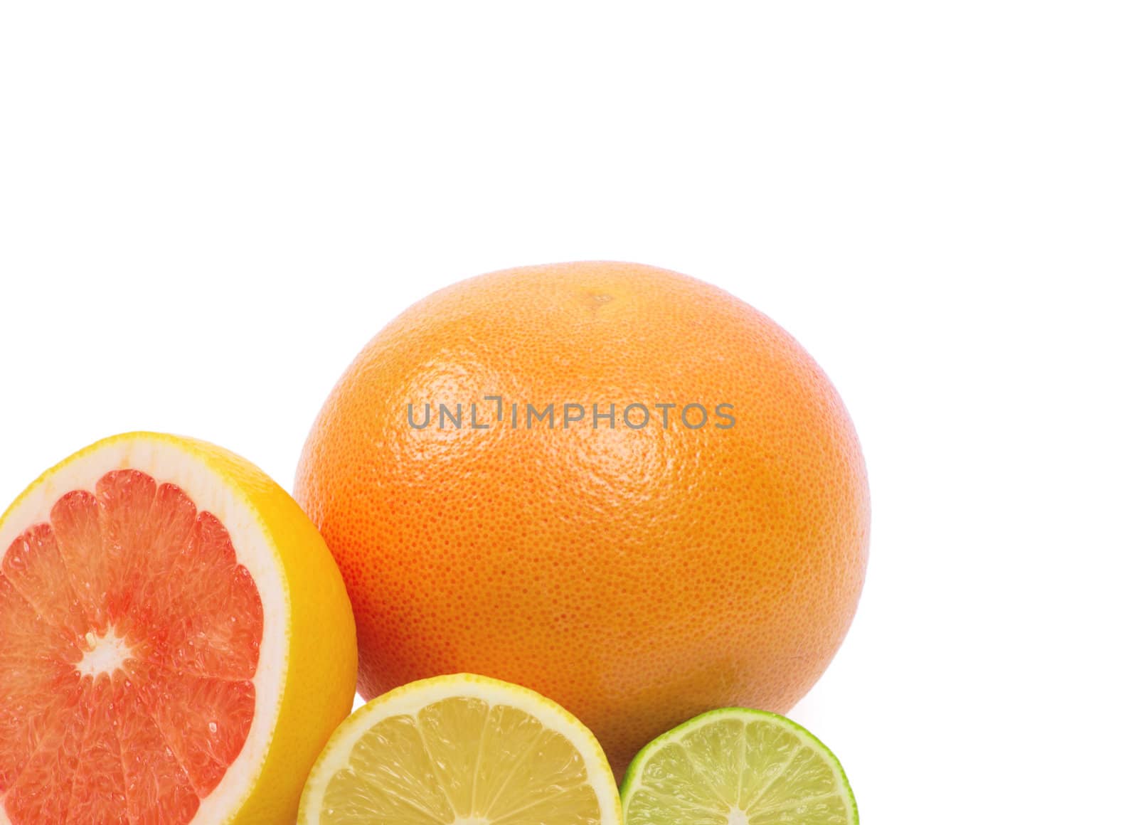 Image of a fresh whole lime, lemon and orange isolated on white