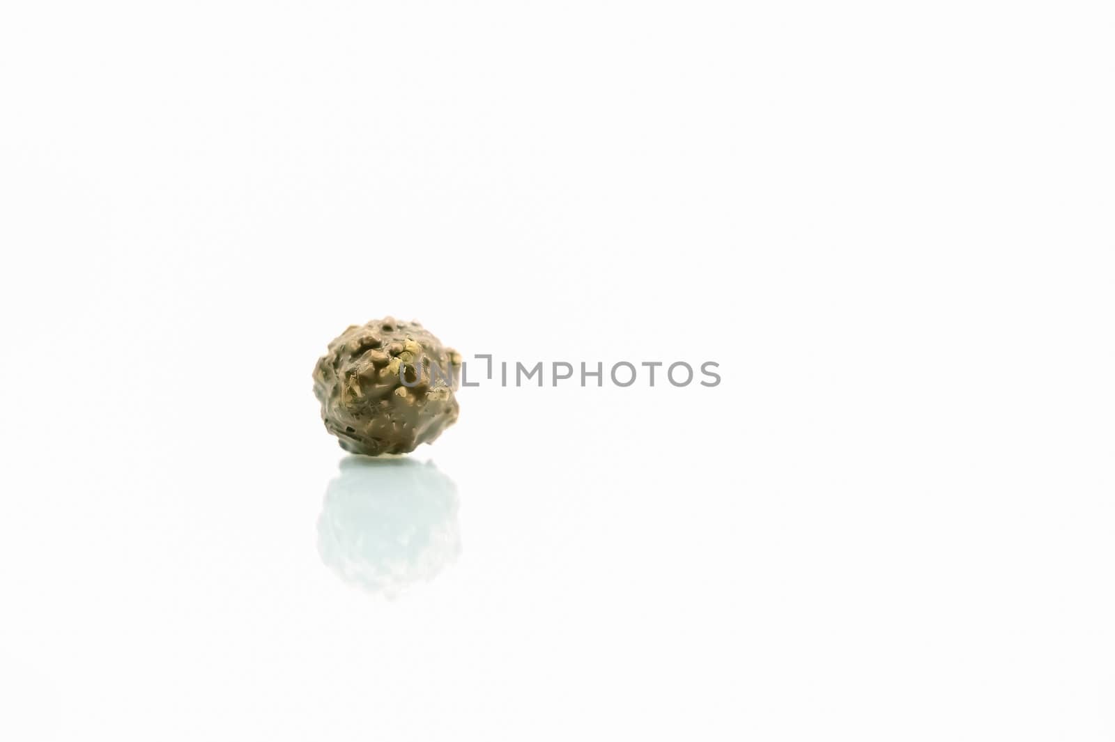 Chocolate ball isolate on white background with reflection by moggara12