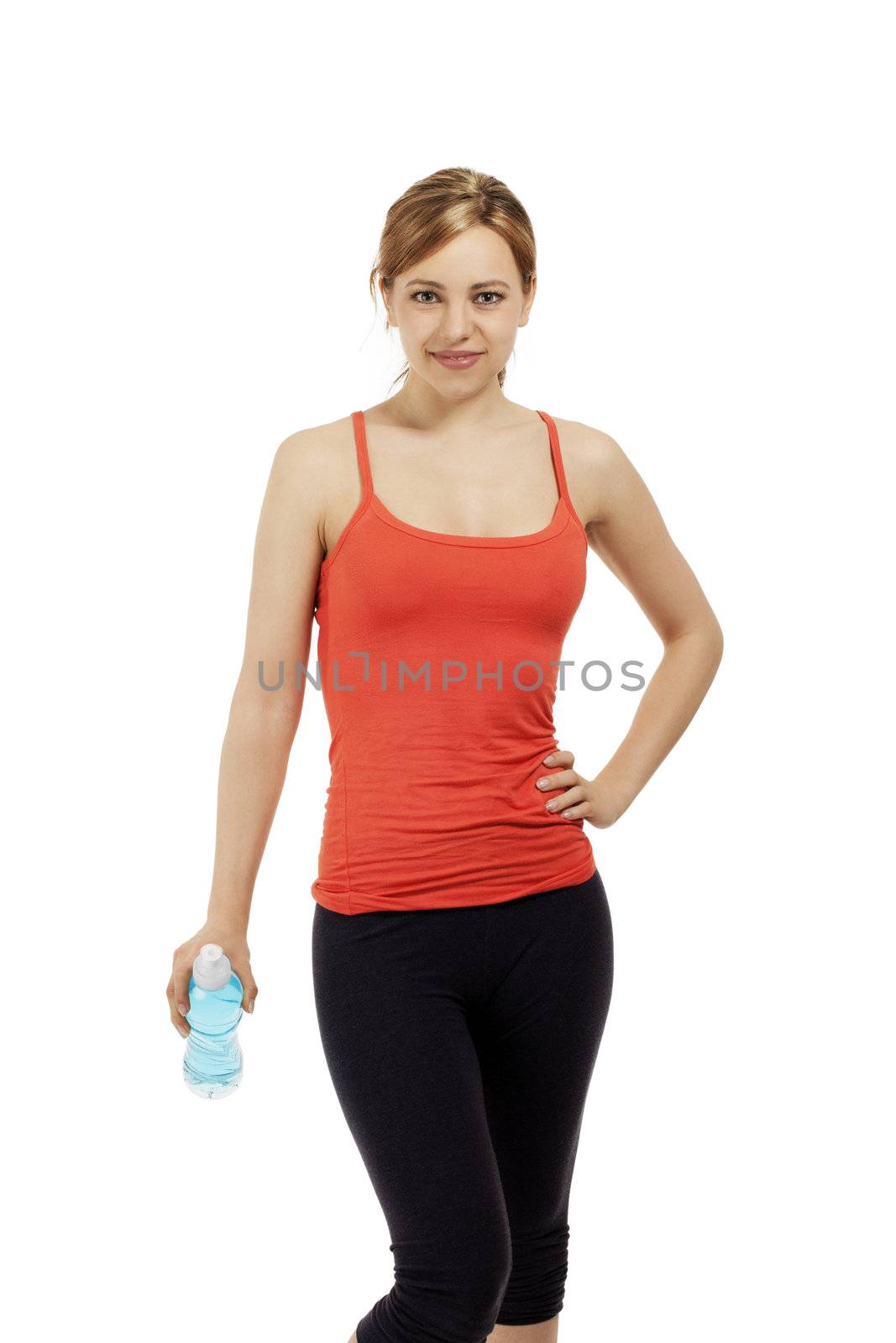 young fitness woman with a bottle of water on white background