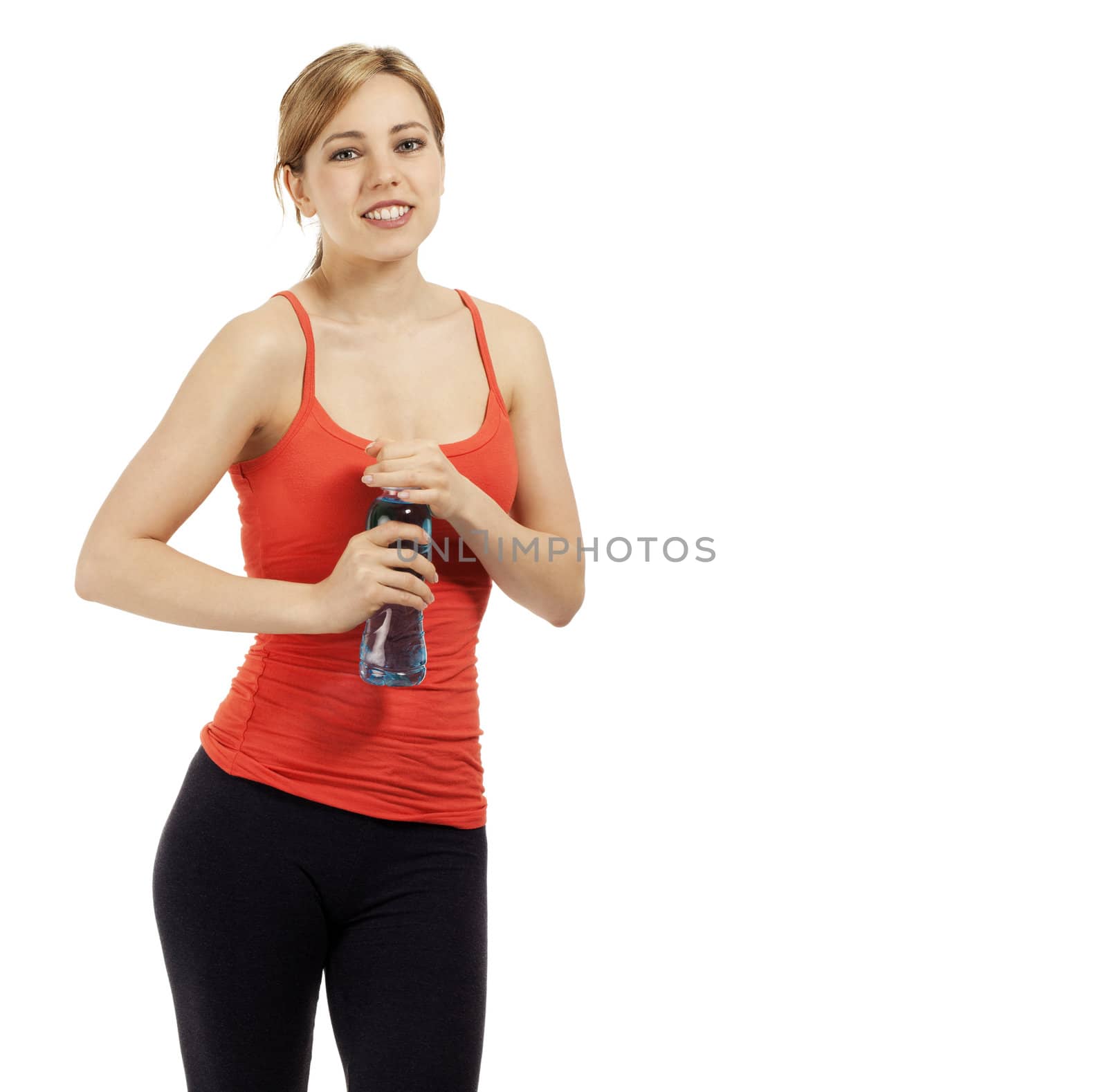 young beautiful fitness woman opening bottle of water on white background