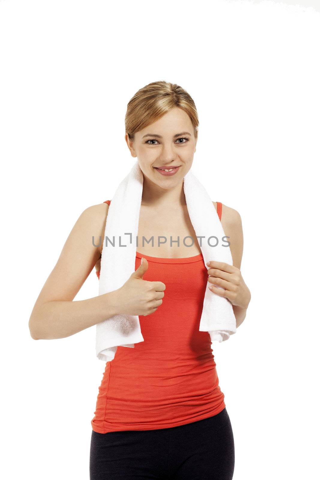 smiling fitness woman showing thumb up by RobStark