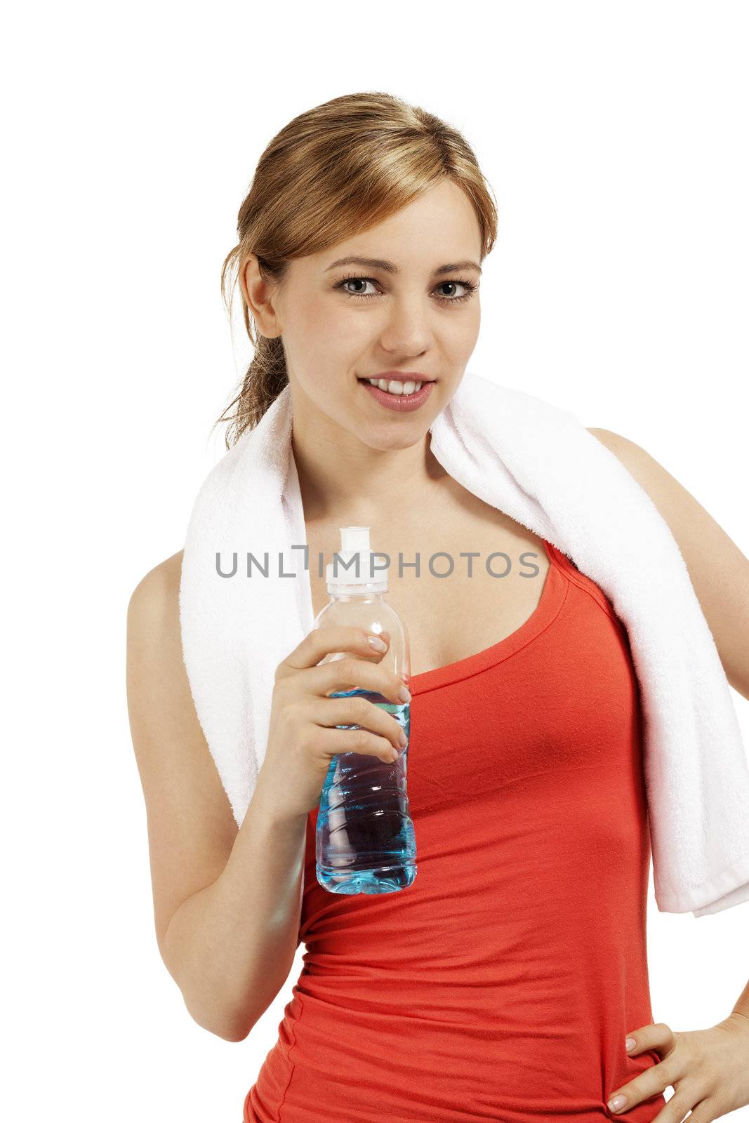 young smiling sporty woman with a bottle of water on white background