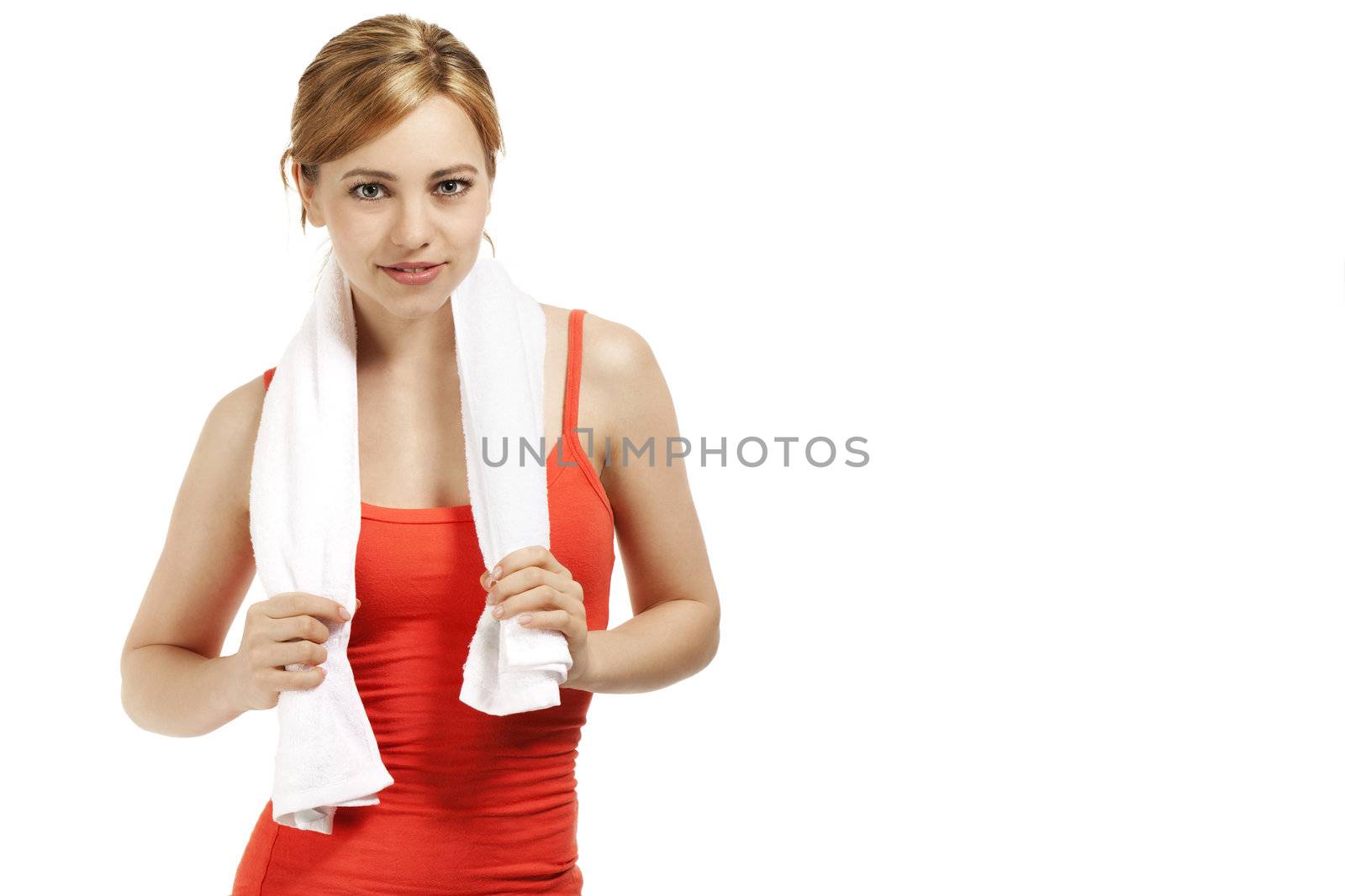 portrait of a young smiling fitness woman on white background