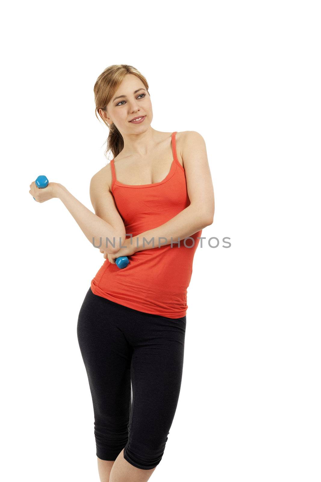 young smiling fitness woman with blue dumbbells looking to side  on white background