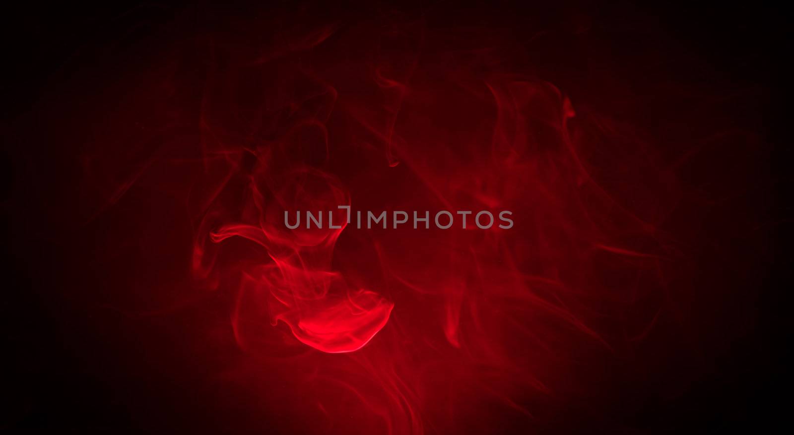 Red smoke in the dark on black background by moggara12