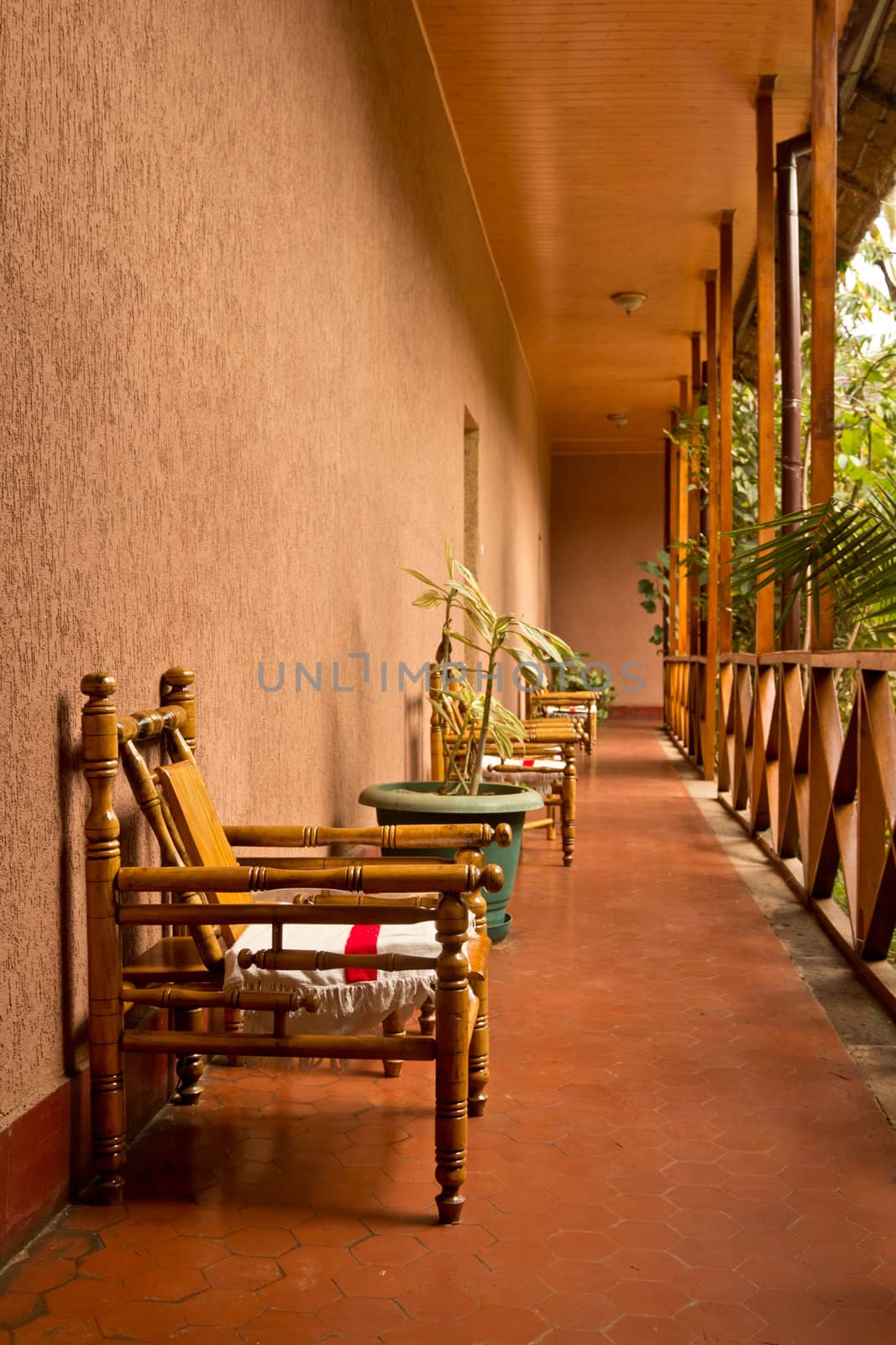 Traditional Ethiopian wooden chairs on the corridor of a hotel room in a very relaxing environment