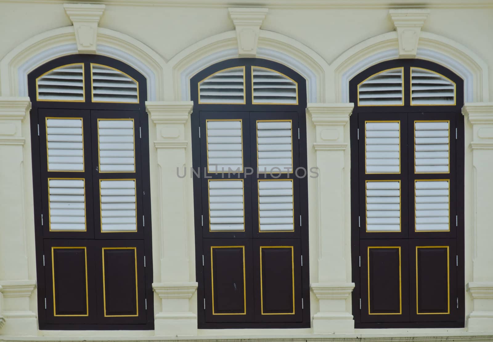 old window in phuket, thailand