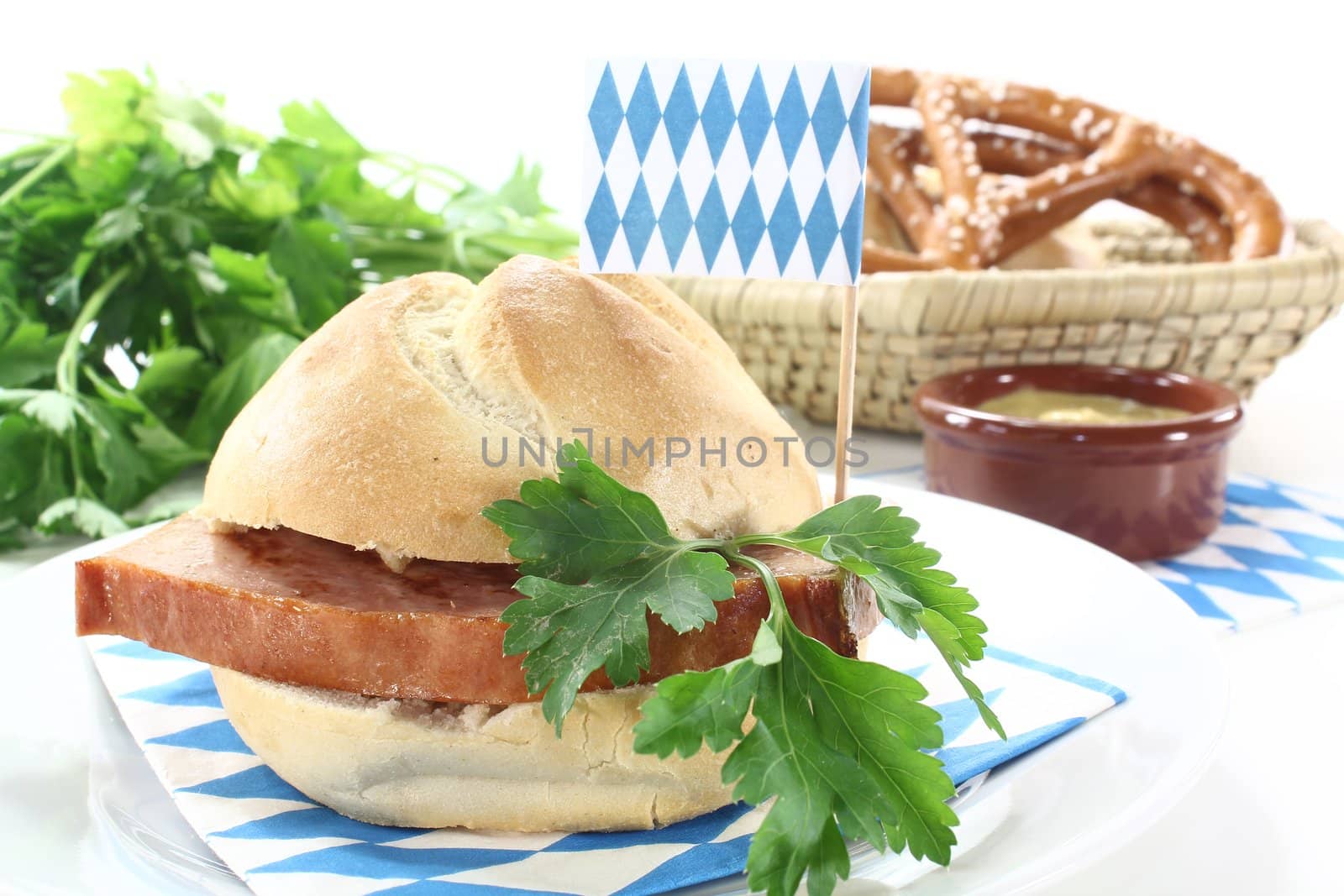 Roll with beef and pork loaf, parsley on a light background