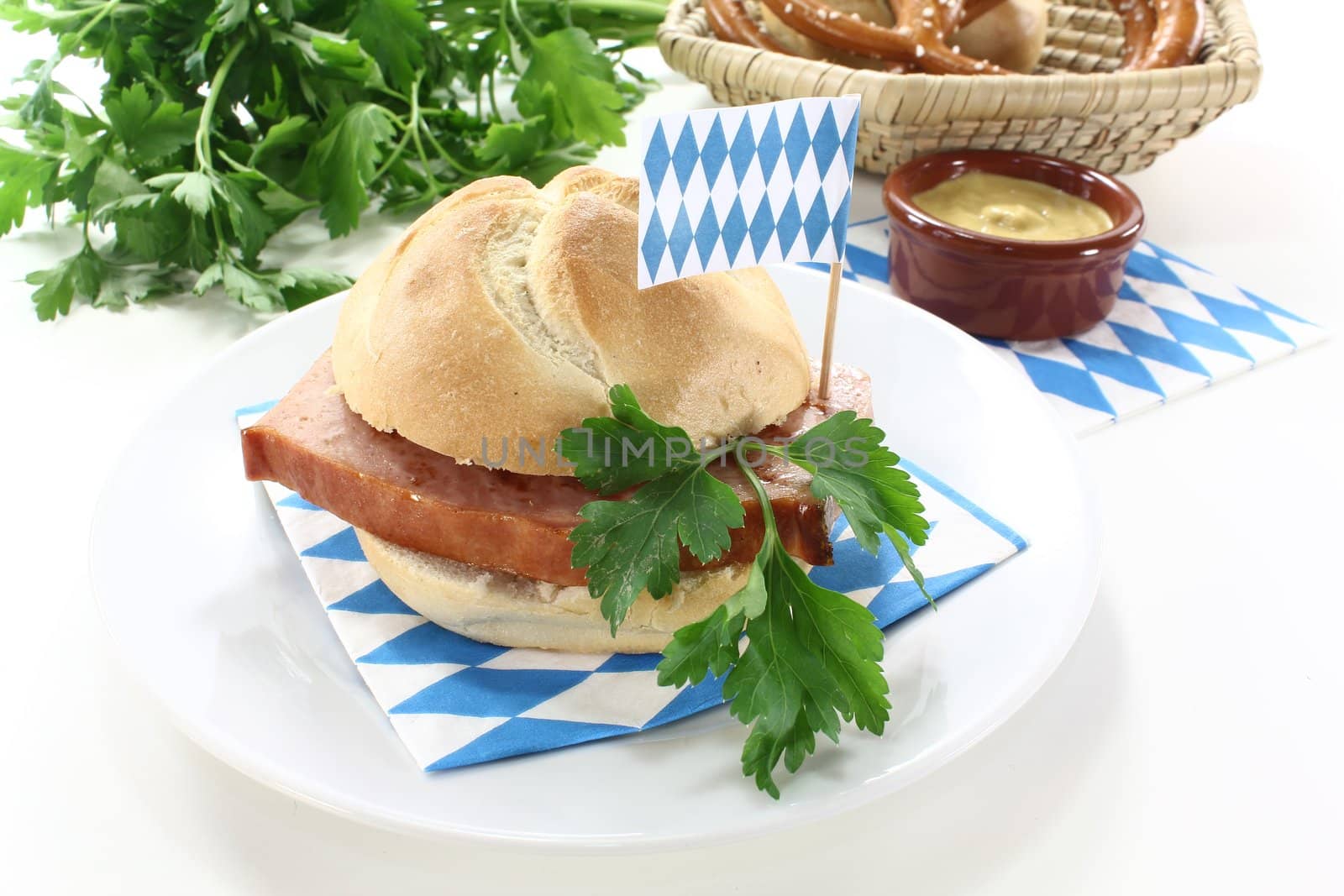 fresh Roll with beef and pork loaf, parsley on a light background