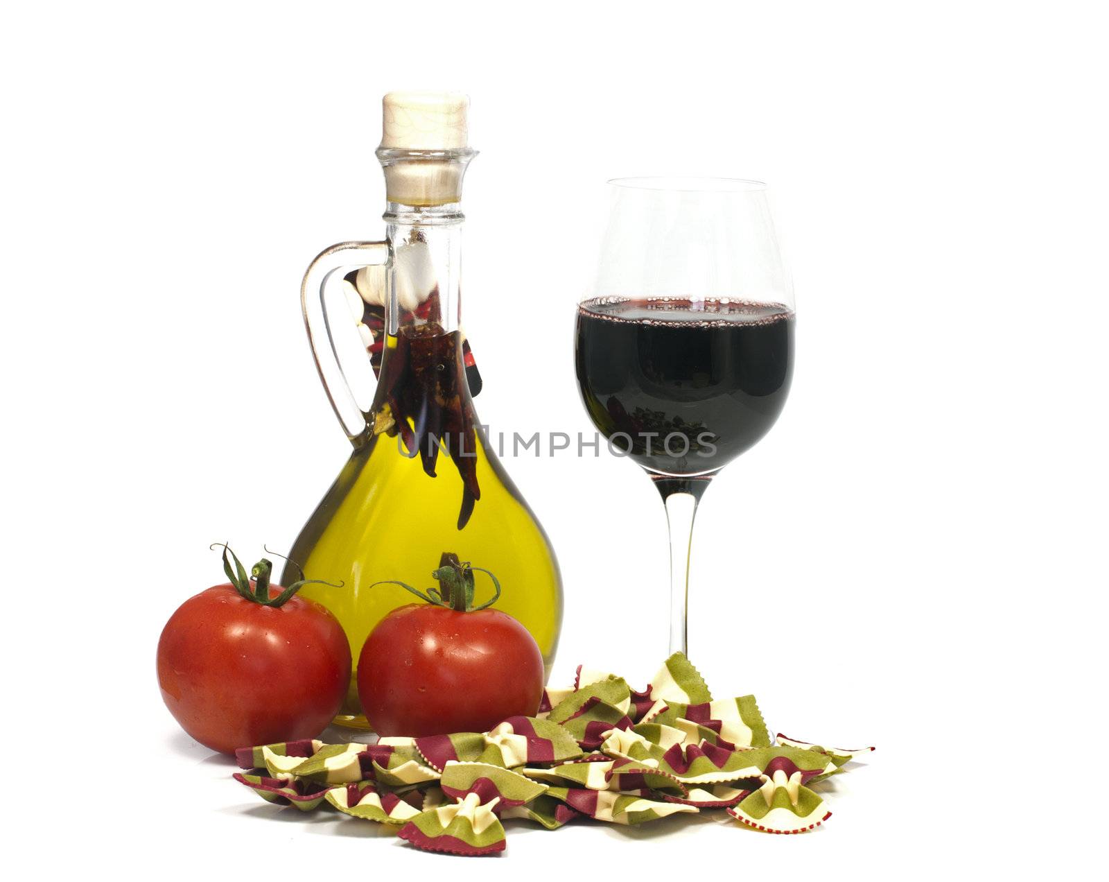 tomato bottle of oil and glass red wine with pasta