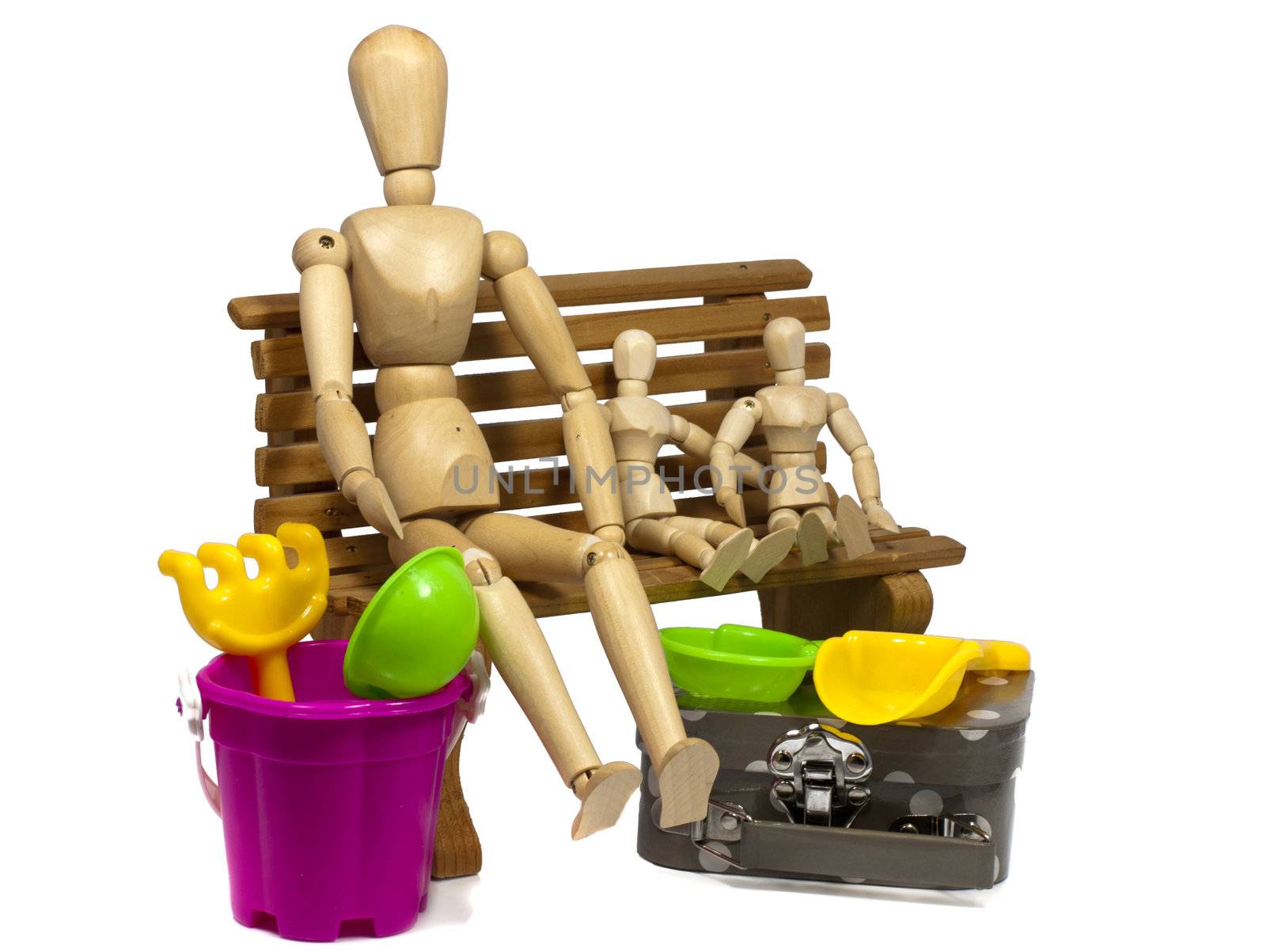 father and kids sitting on a wooden seat