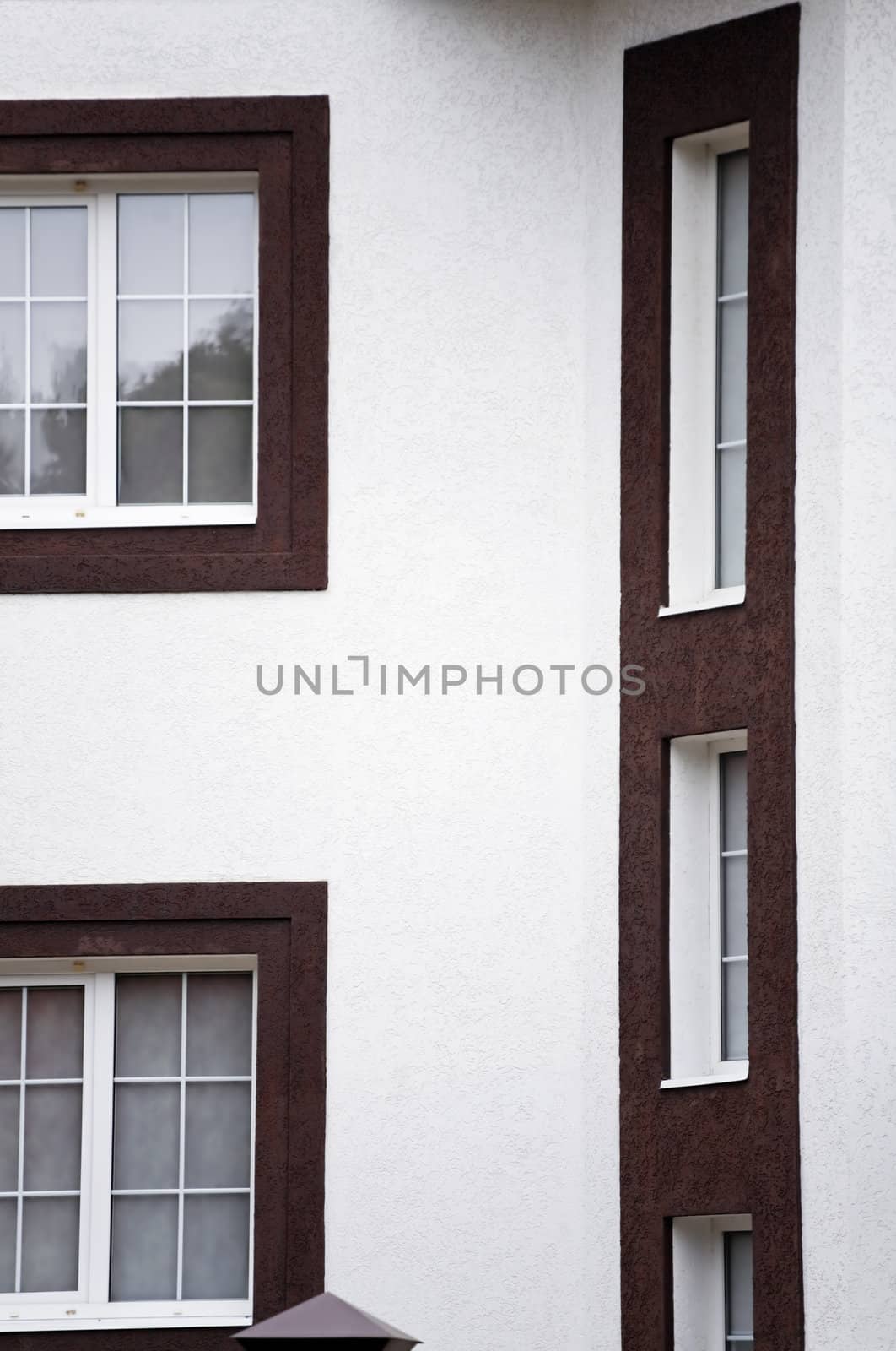 windows and white wall of modern house