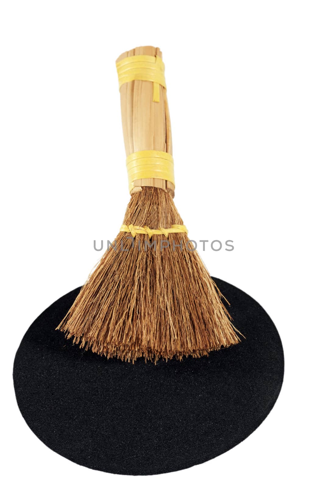 Whisk broom in black spot isolated on white background