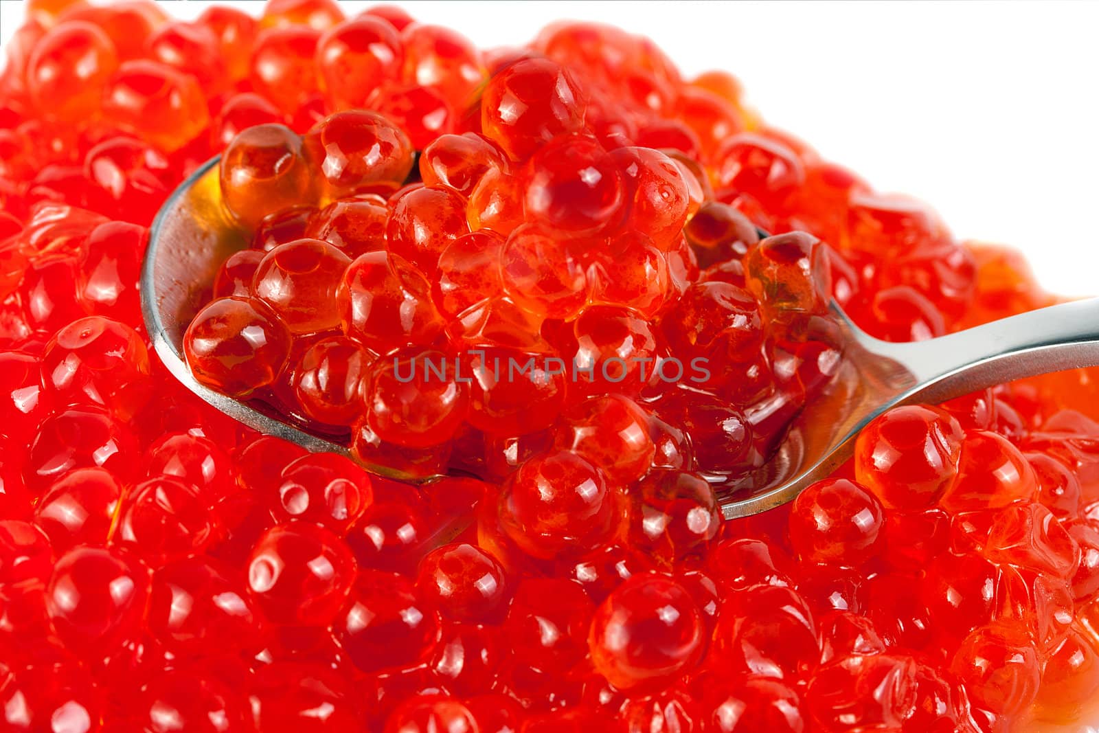 spoon red caviar isolated on white background