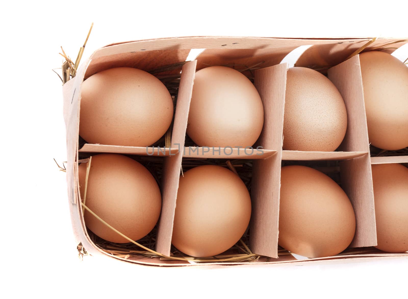 Eggs in organic pack isolated on white background