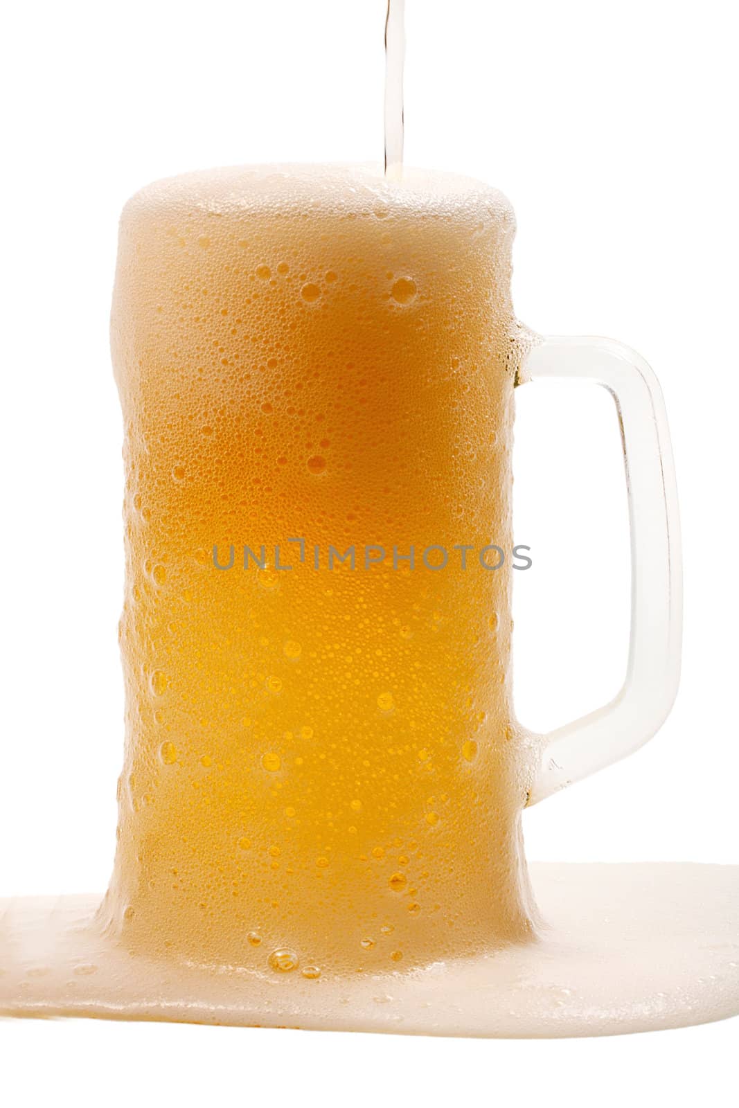 beer mug full and coins isolated on white background