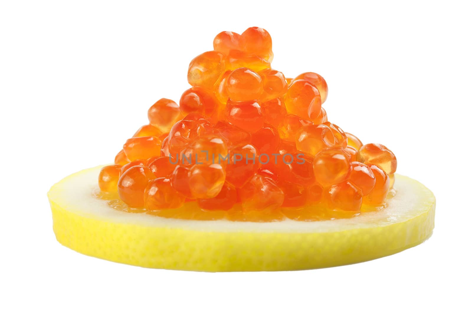 red caviar in lemon on white background