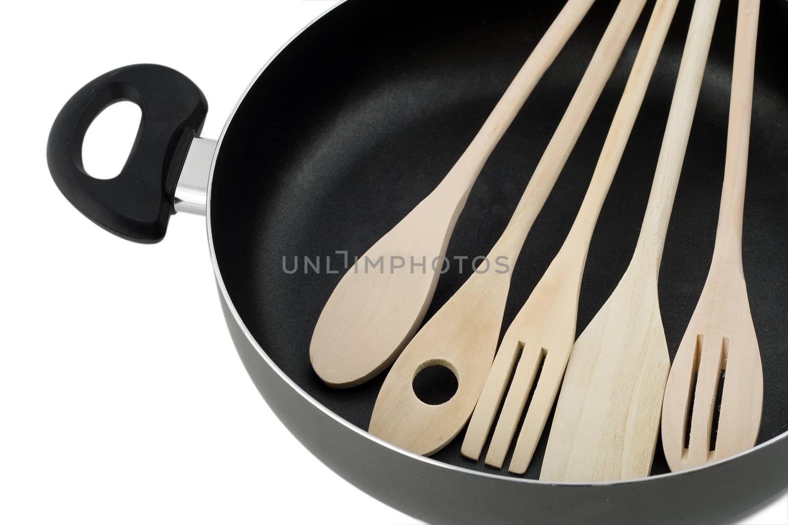 Assorted wooden cutlery isolated on white background