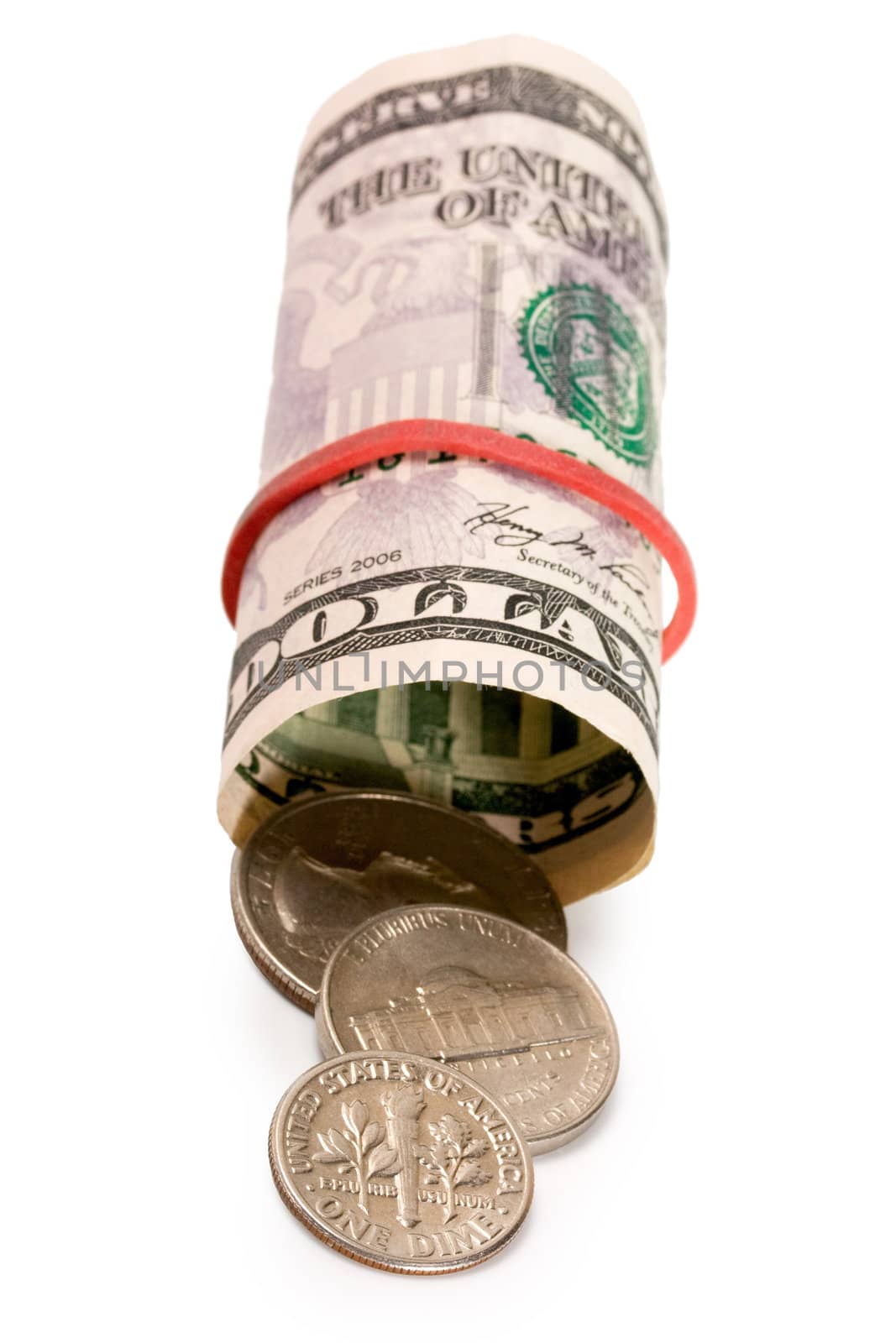 Pile of money notes and coins isolated on white background