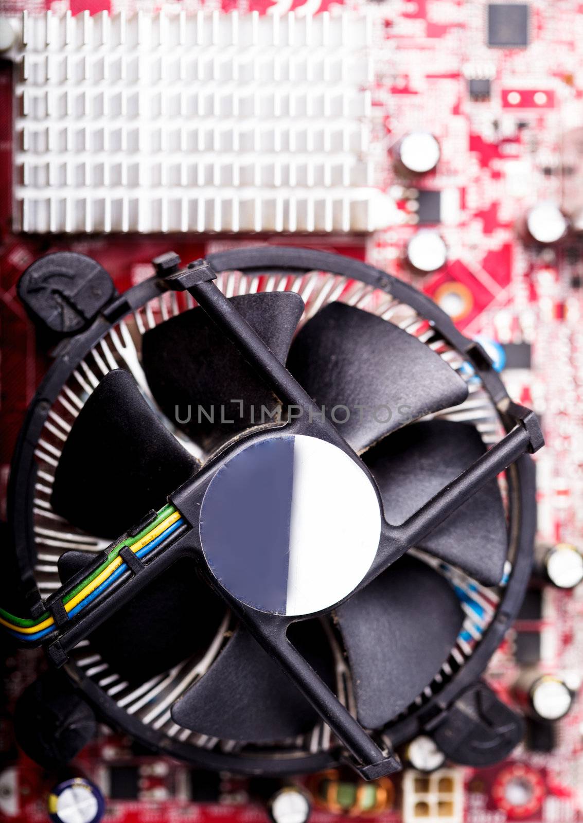 CPU cooler close up on the computer's motherboard